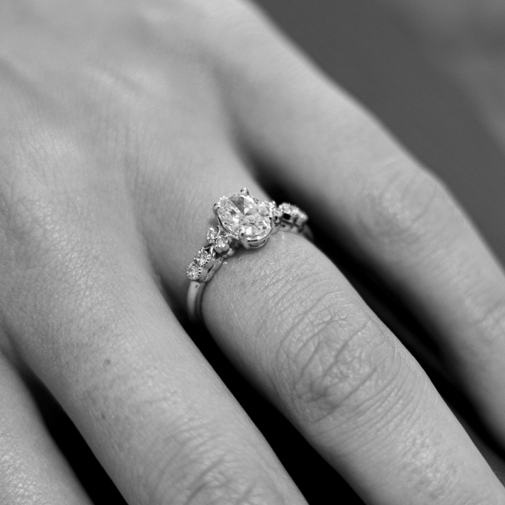 1ct Oval Diamond Ring With a Brilliant Round Accent Stones