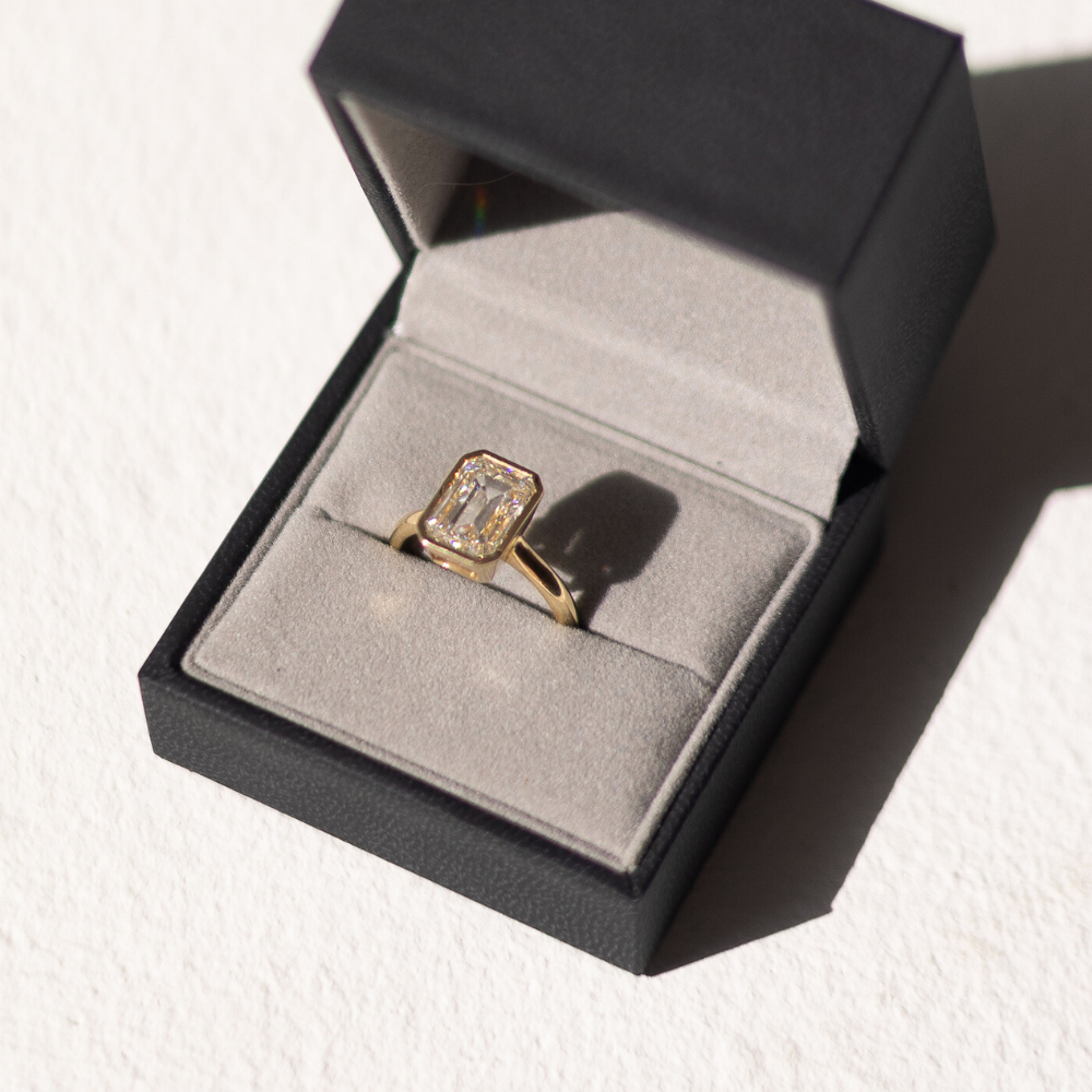 3ct Emerald Cut Diamond Bezel-Set Ring in 14k Yellow Gold