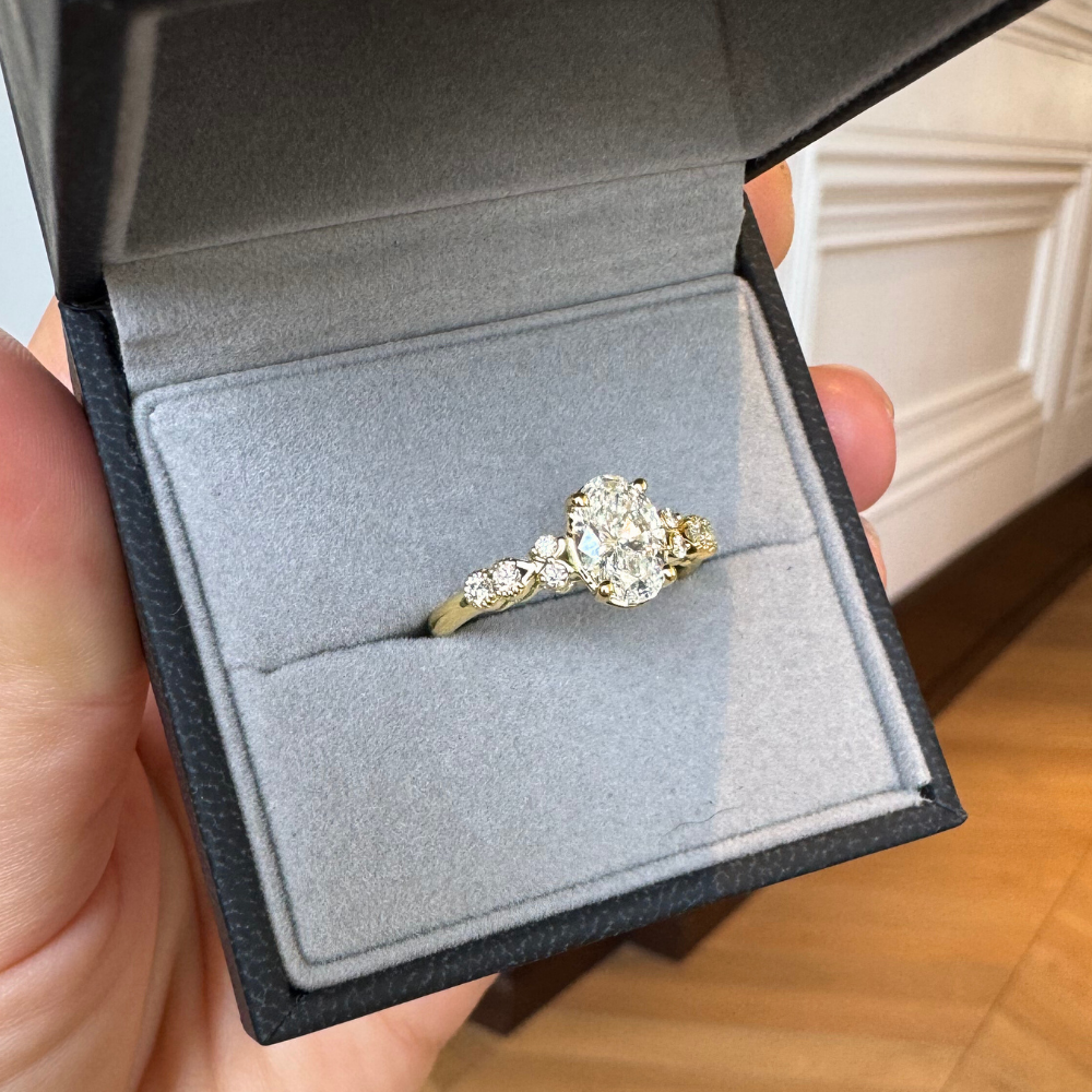 1ct Oval Diamond Ring With a Brilliant Round Accent Stones
