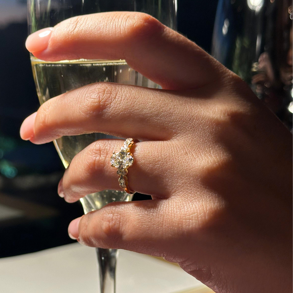 1ct Oval Diamond Ring With a Brilliant Round Accent Stones