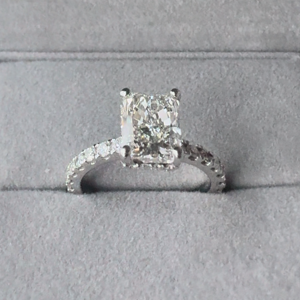 1,9ct Radiant Cut Diamond on a Pavé Band With a Hidden Halo